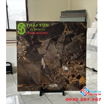 Gạch trung quốc 100x100 đen tuyền đường chỉ màu vàng đồng