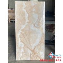 Đá bóng kiếng 60x120 khắc kim vàng