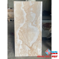 Đá bóng kiếng 60x120 khắc kim vàng