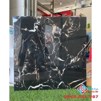 Gạch bóng kiếng 60x60 đen vân cam