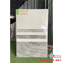 Gạch ốp tường cmc 30x60 bóng kiếng vân đá xám đậm nhạt