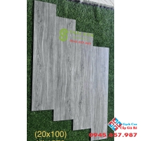 Gạch trung quốc 20x100 vân gỗ xám lát nền phòng khách