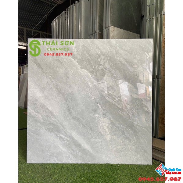 Gạch cmc lát nền 100x100 bóng kiếng màu xám xanh vân đá