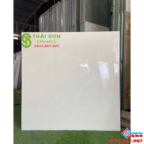 Gạch cmc 100x100 bóng kiếng vàng kem lát nền