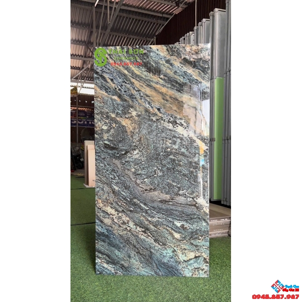 Gạch bóng kiếng 60x120 lát nền catalan vân xanh ngọc pha xám đen